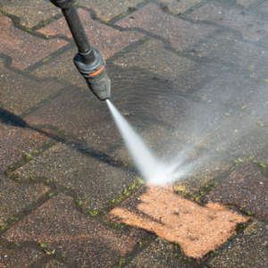 Pressure washing to show the difference in paved area